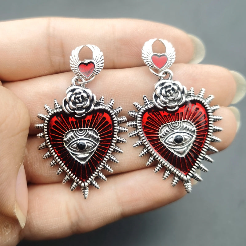 Heart Eye Spiked Earrings