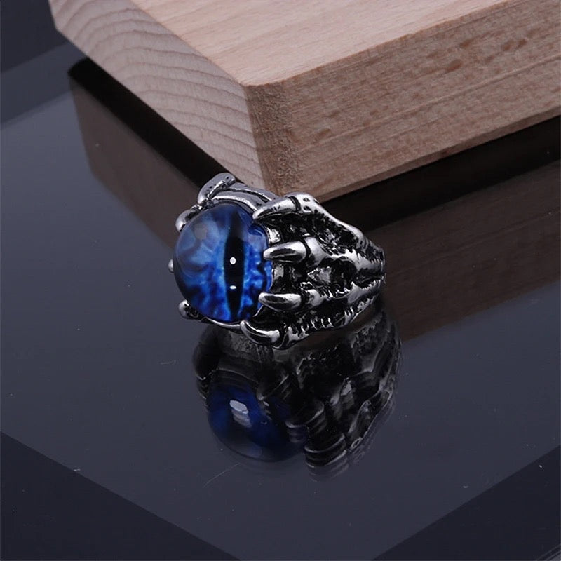 Close-up of Demonic Eye Ring in Blue with Dragon Eye and Claw Detail