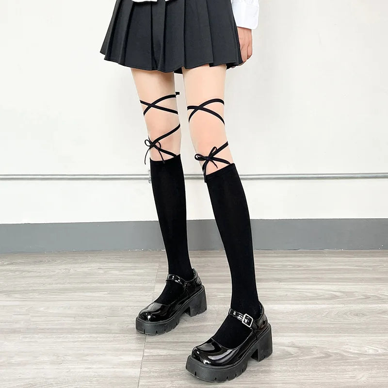 Side view of Kawaii Straps Split Fishnet Tights, ideal for alt, rave, and Harajuku styles